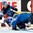 MINSK, BELARUS - MAY 25: Finland's Jarkko Immonen #26 and Russia's Sergei Shirokov #52 go down at the side of the net during gold medal round action at the 2014 IIHF Ice Hockey World Championship. (Photo by Richard Wolowicz/HHOF-IIHF Images)

